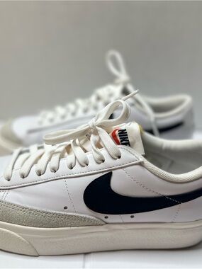 Nike White Leather Sneakers with Black Swoosh and Cream worn once 7.5
